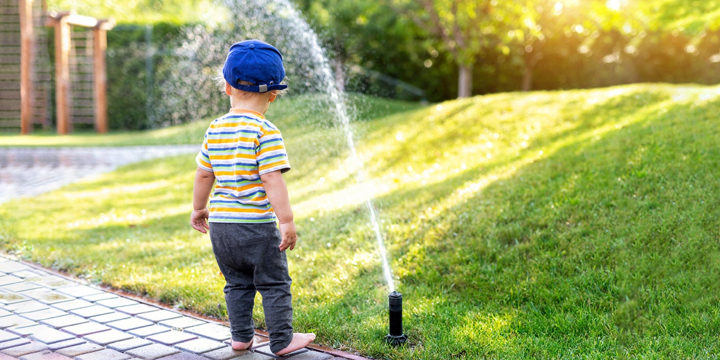 Boy with sprinkler