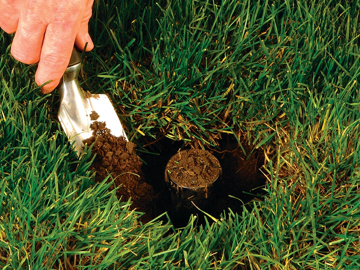 remove dirt from around the sprinkler head