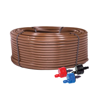 Drip irrigation coil and nozzle