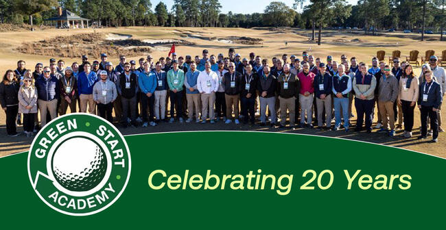 Green Start Academy attendees standing on a golf course with text stating "Celebrating 20 Years"