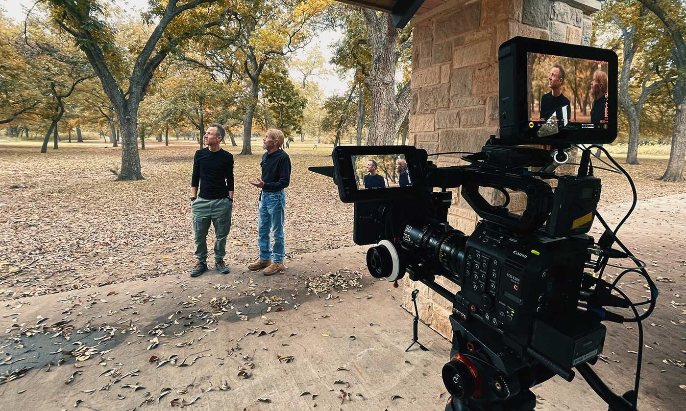 2 guys in front of camera with Quincentennial Bur Oak behind them