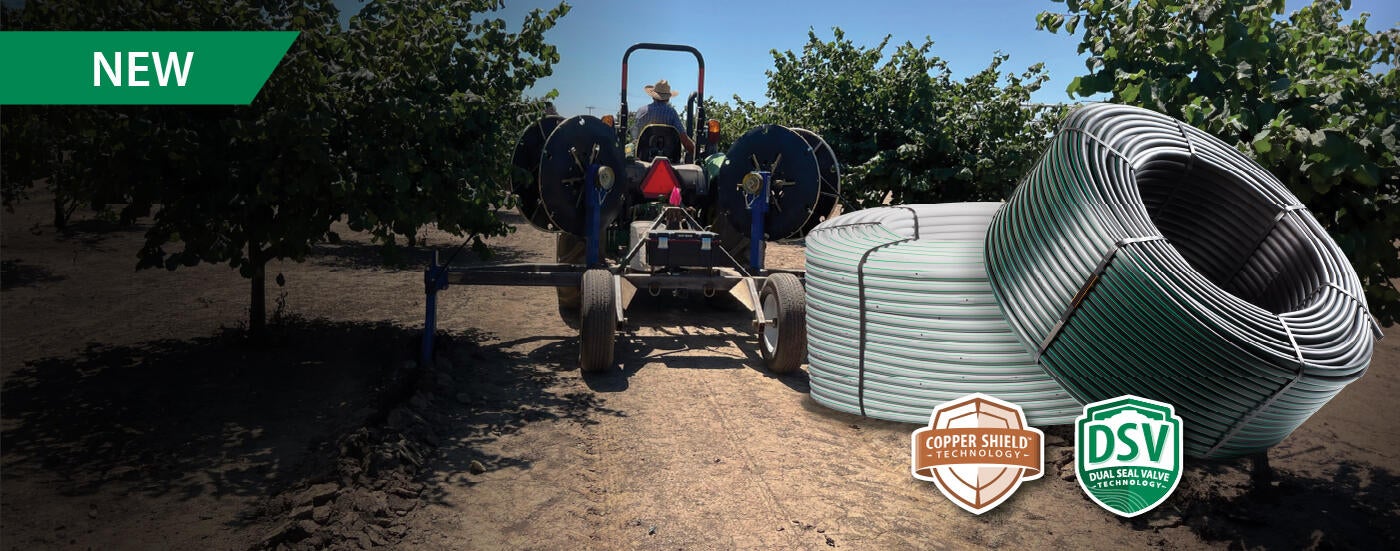 Product photo of dripline overlayed on an image of an orchard with a farmer driving a tractor.